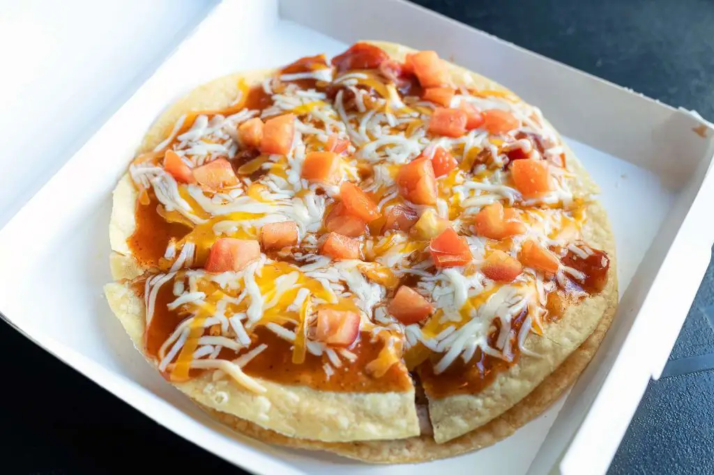 What kind of tortilla is Mexican Pizza made of