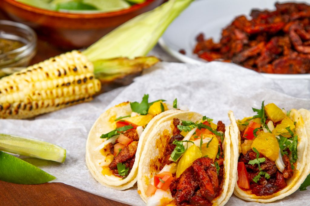 What cut of meat is used for tacos al pastor