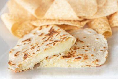 What cheese do Mexican restaurants use in quesadillas